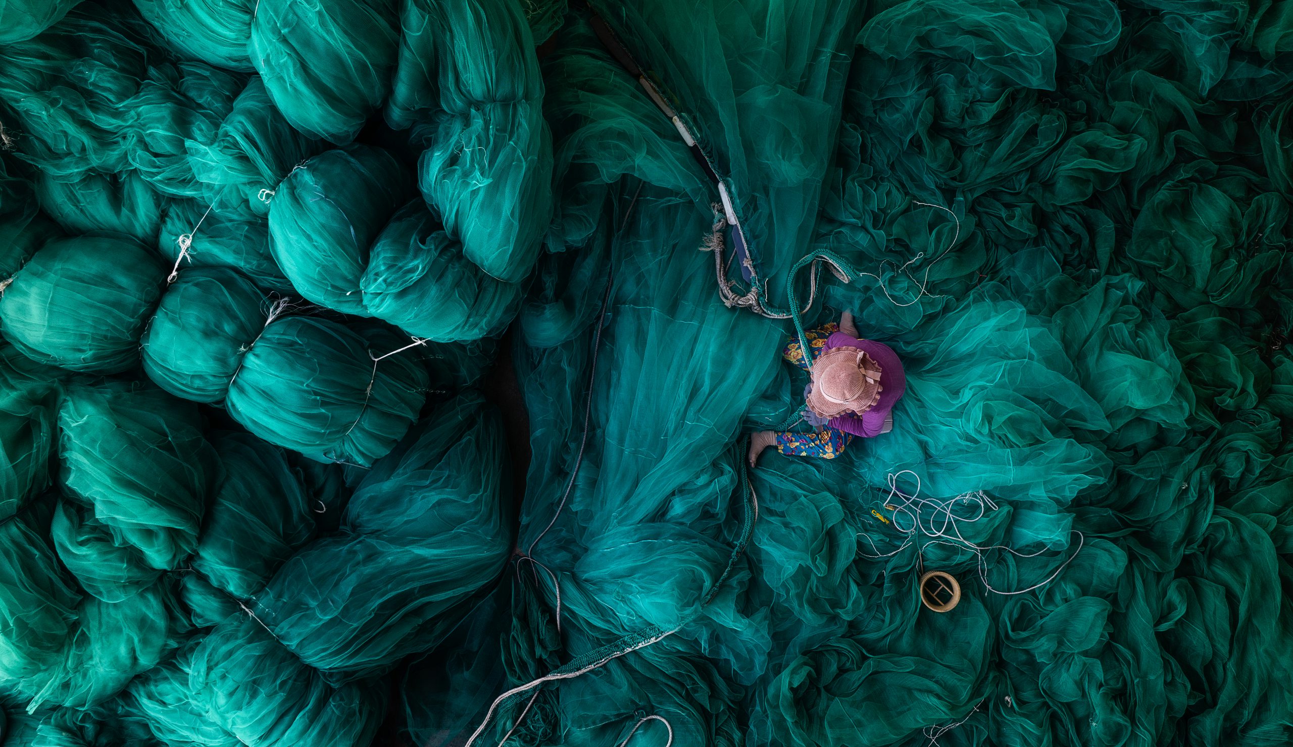 Mending nets in Nha Trang, Khanh Hoa